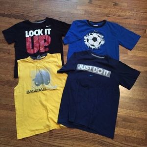 Lot of 4 size 7 small Nike play shirts