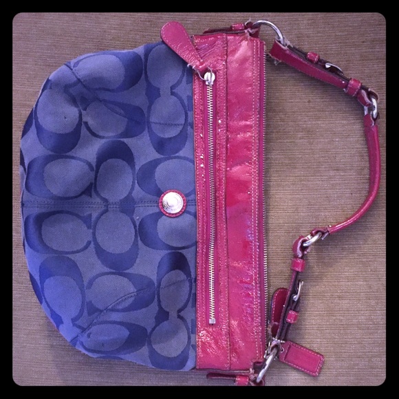 Navy blue coach purse with pink patent leather