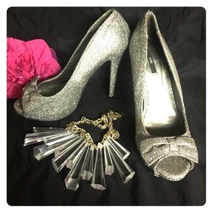 IXX Silver Peep Toe Pumps