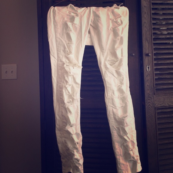 Bebe destroyed white jeans