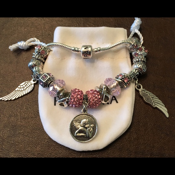 PANDORA Engraved Bracelet with charms and pouch.