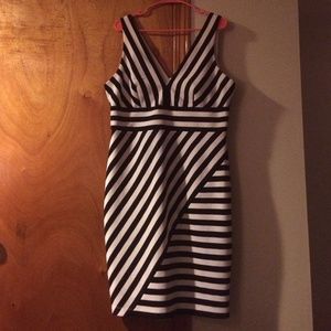 Beautiful fitted asymmetrical lined dress!