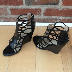 Black suede caged straps snakeskin leather wedges