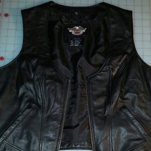 Ladies Harley Davidson Leather chaps and vest.