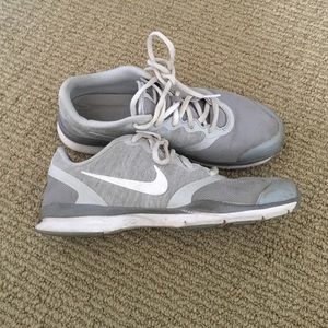 Grey Nike tennis shoes