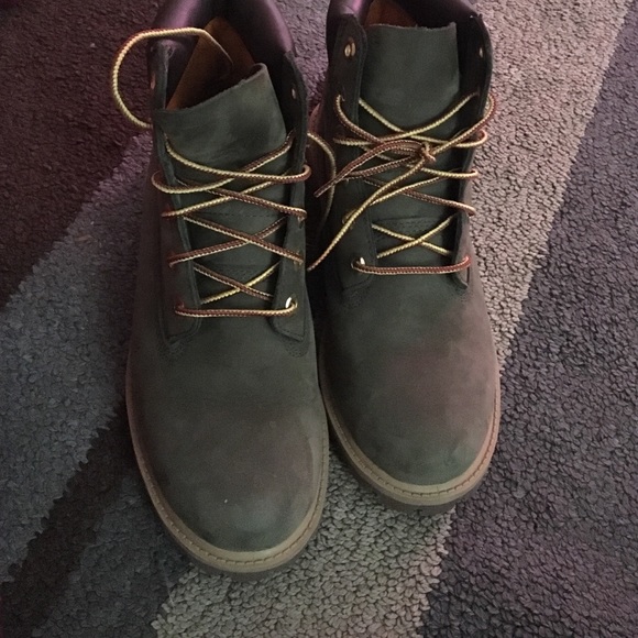Worn olive timberlands
