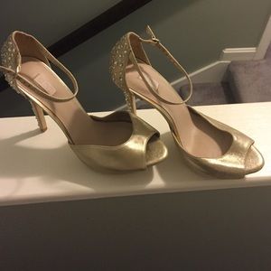 Strappy champagne colored heels