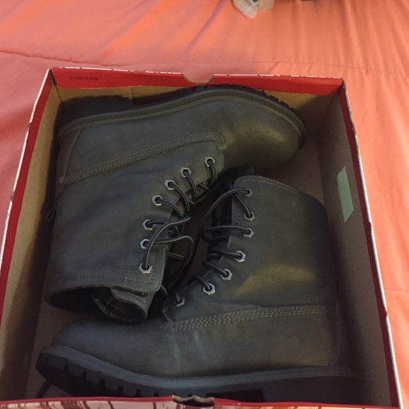 Brand new lace up boots.