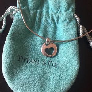 Auth Tiffany heart in round pendant necklace