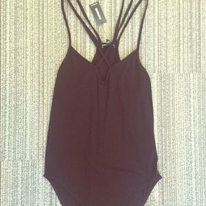Black criss cross onesie from Express