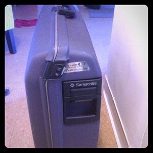 Blue Samsonite two wheeled luggage