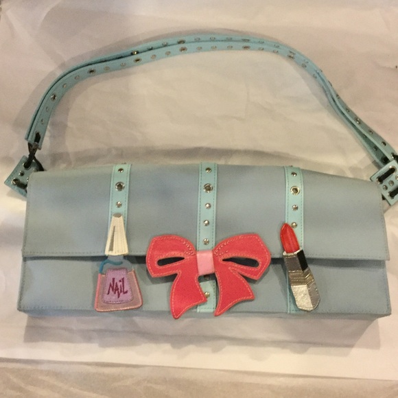 Super cute Michael Simmons purse.