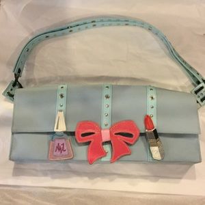 Super cute Michael Simmons purse.