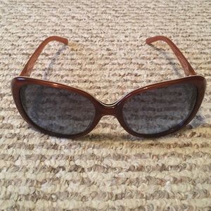 Tory Burch sunglasses.
