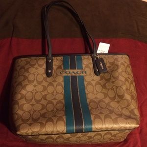 Authentic Coach duo stripe zipper bag.