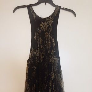 Lacey black and gold cutout top