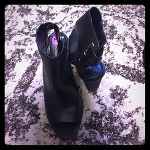 BCBG peep toe booties in black leather with gold