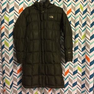 Down jacket. Small zipper rip. See photo.