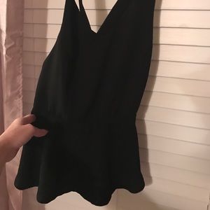 Crisscross back peplum top in black large