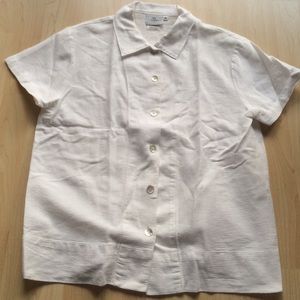 White. 100% cotton. Made in the USA.