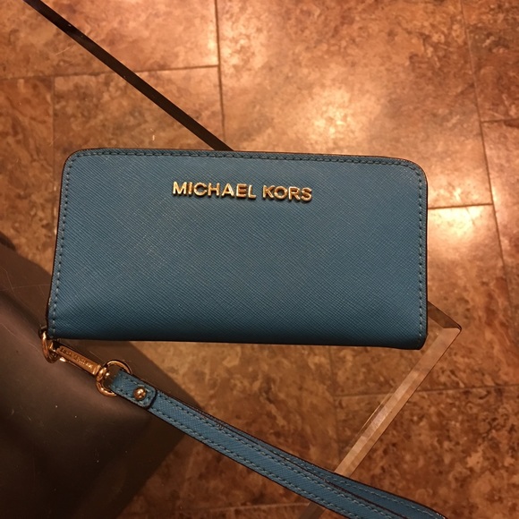 Blue Michael Kors wristlet