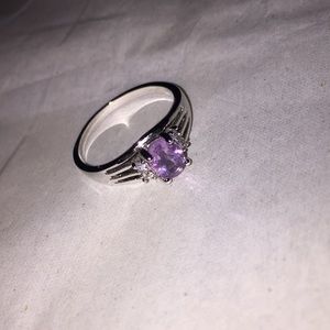 Beautiful silver ring with a purple stone