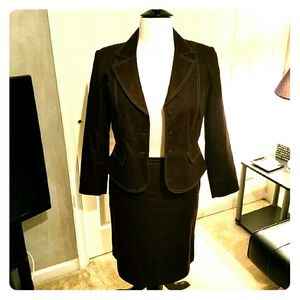 Brown denim skirt suit.