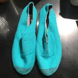 Turquoise Sanuk size 9 slip ons