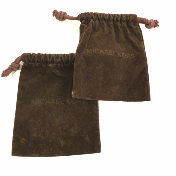 Two Michael Kors jewelry bags