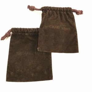 Two Michael Kors jewelry bags