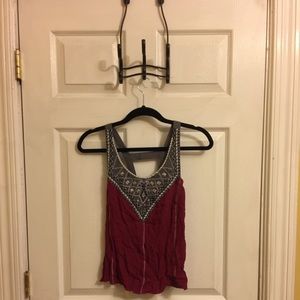 Red wide strap tank with "dazzle" top