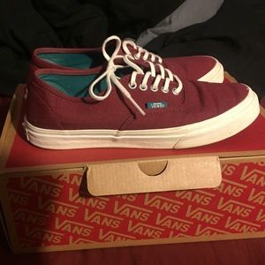 Burgundy vans. Size 7 in women's.