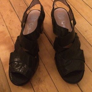 Jeffrey Campbell black patent heeled sandal.