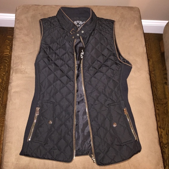 thin black vest