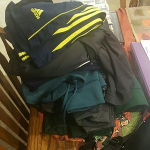 Lot of brand name hoodies and shorts.