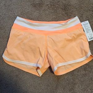 Lululemon Groovy Run shorts size 10 orange