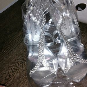 Heels new. Never worn