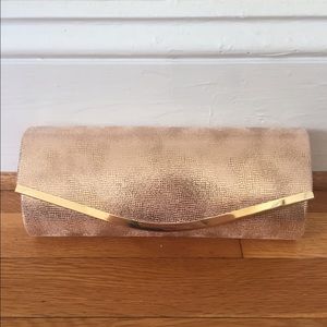Lulu Townsend (DSW) rose gold clutch