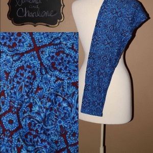 Tc purple and blue Aztec print leggings.