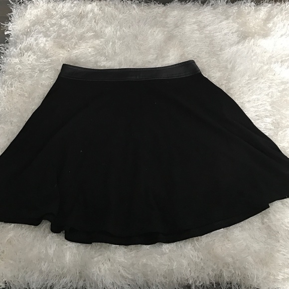 Black A-Line skirt with Leather Wait band.