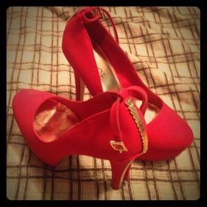 Heels. Golden trim. Brand new. Never been worn.