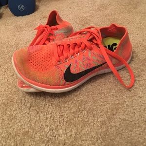 Neon & Multi NIKE Flyknit Free Runs.