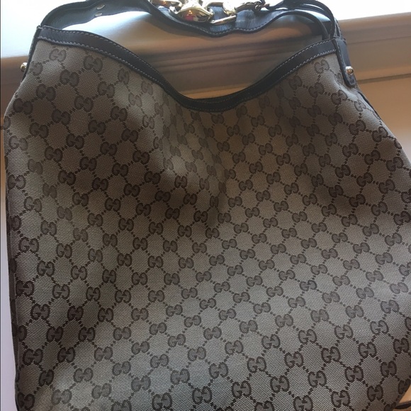 Gucci canvas shoulder bag with gold hardware