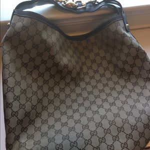Gucci canvas shoulder bag with gold hardware