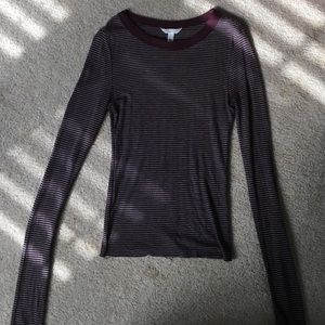 Tight long sleeved shirt. Long sleeved.