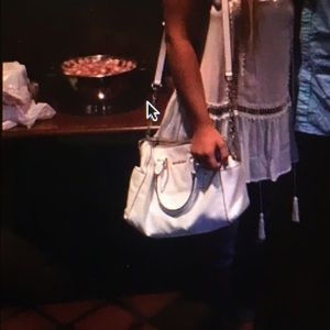 White leather MK purse.