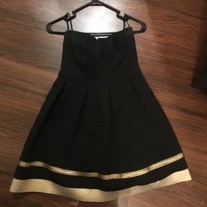 Sweetheart black & gold poofy dress