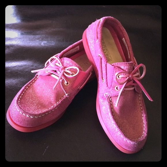 A pretty pink Sperry top-sider slip on.