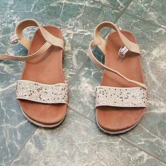 Cream colored gladiator sandals