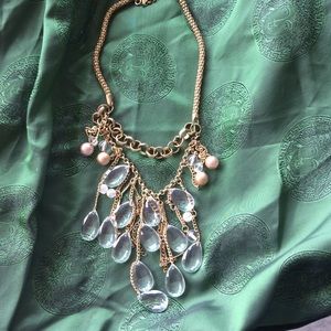 Gold drop necklace with lots of crystals.